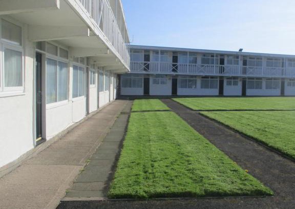 Prestatyn Ski Chalet | Beachfront Retreat at Beaches Chalets with Pool & Ocean Views
