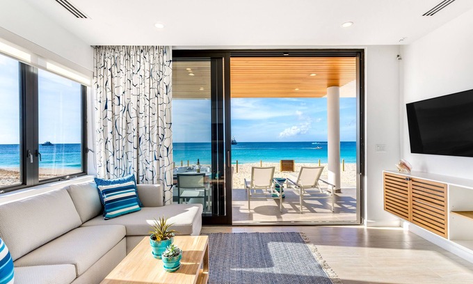 West End Village Condo | Beachfront 1-Bedroom Retreat with Hot Tub at Tranquility Beach