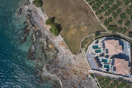 Riglia Villa | Beachfront Alassa Villas: Private Pools & Ocean Views