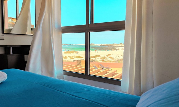 El Cotillo Apartment | Beachfront Bliss with Spectacular Ocean Views & Pool Access