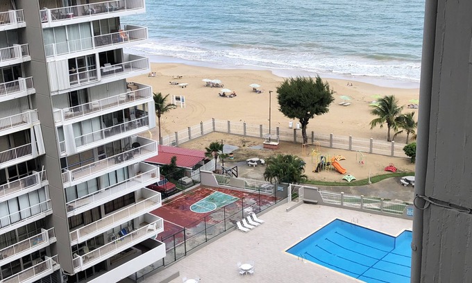 Isla Verde Apartment | Beachfront Oasis: Carolina Coral Beach Apts with Ocean View
