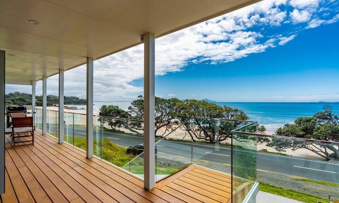 Langs Beach House | Beachfront Langs: Spectacular Views with Spa Pool Amenities