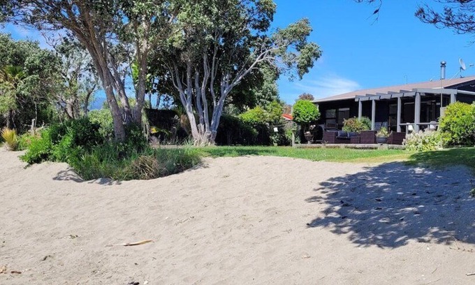 Parapara House | Seaside Sanctuary - Experience Beachfront Bliss Today