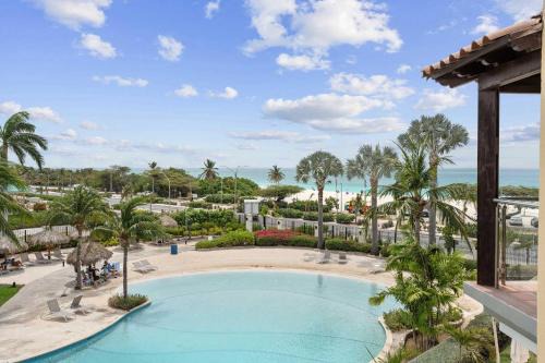 Oranjestad-West House | Exclusive Oceanfront One-Bedroom Condo with Pool Amenities