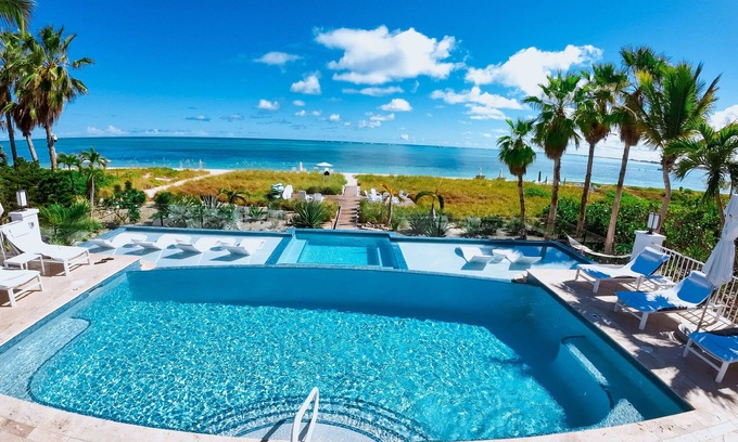 Grace Bay West Villa | Beachfront Bliss at Grace Bay Beach - Sleeps 12, Guest Rated 10/10