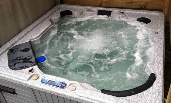 Michigan City Apartment | Oceanfront Escape with Hot Tub, Bikes & Kayaks Await
