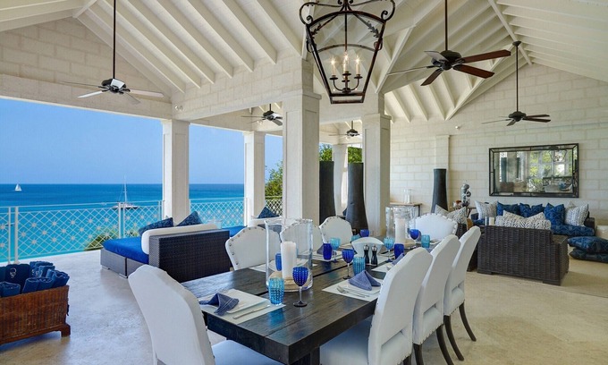 Old Trees Bay Apartment | Relaxing Beachfront 4 Bedroom Apartment with Heated Jacuzzi
