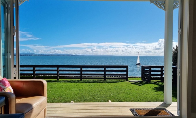 Clarks Beach Cottage | Beachfront Escape: Pet-Friendly with Ocean Views & Spa