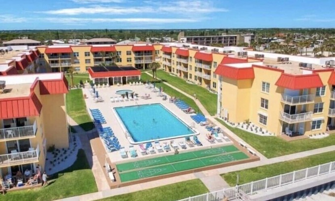 Point East Condo | Beachfront Oasis with Balcony & Stunning Ocean Views