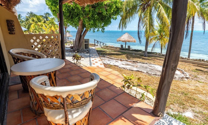 Isla Mujeres Cottage | Beachfront Palapa Cottage with Heated Pool & Tropical Gardens