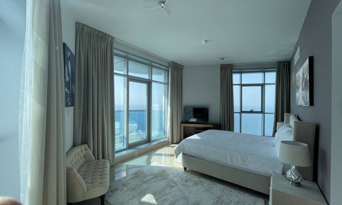 Rumailah Condo | Beachfront Retreat Near Dubai with Ocean View & Spa Access