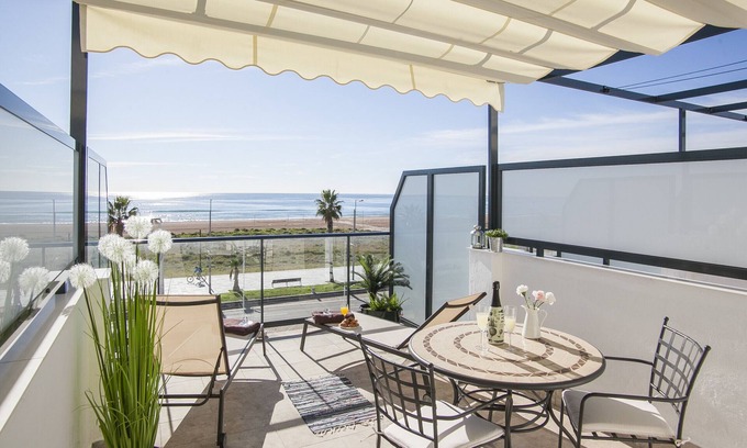 Castelldefels Apartment | Beachfront Penthouse with Spa and Family-Friendly Amenities