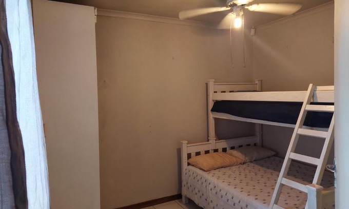 Pumula Apartment | Beachfront Vibe: Family-Friendly Getaway by the Sea
