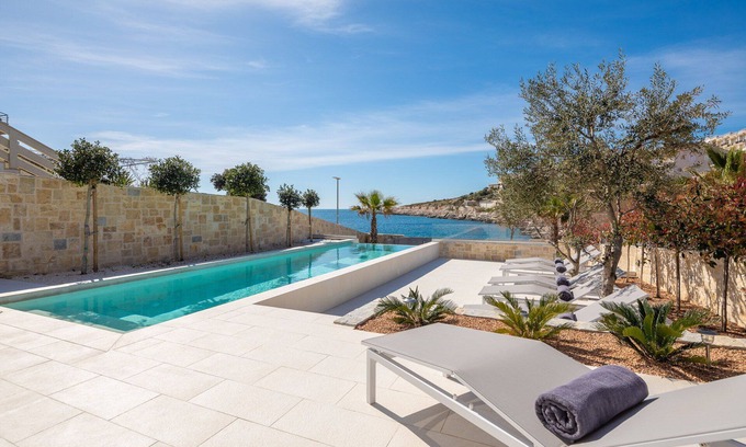 Sevid Villa | Beachfront Villa Sea Colors with Pool