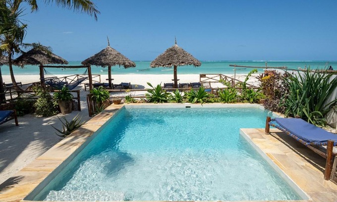 Pwani Mchangani House | Beachfront Villa Thamani: Private Pool & Ocean Views