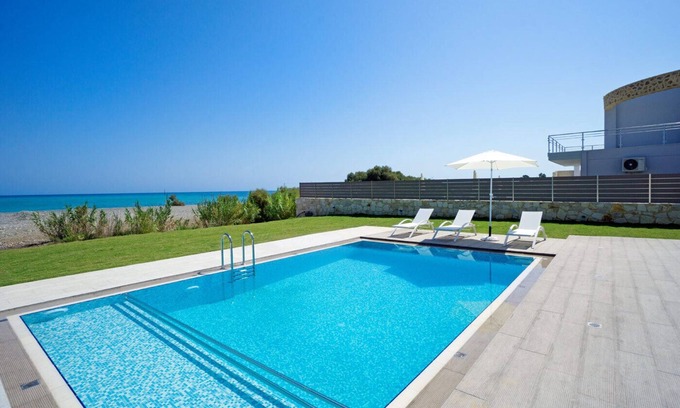 Kamisiana Villa | Beachfront Villa Tavronitis: 2 Private Pools & Ocean Views