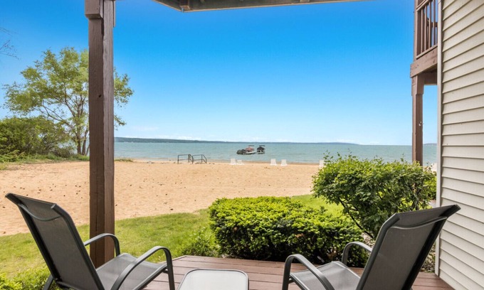 Traverse City Condo | Beachside Haven 102 Beachfront Condo