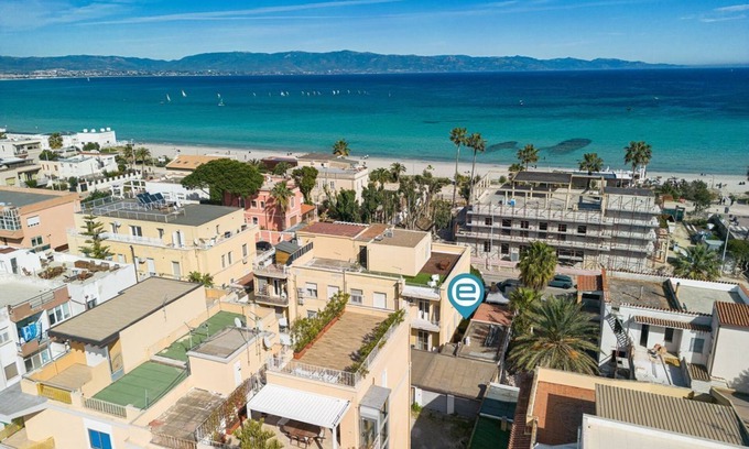 Poetto Apartment | Seaside Poetto Retreat with Breakfast and Family Amenities