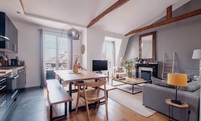 Clignancourt Apartment | Explore Beams and Dreams with Spa, Kitchen & Family Options