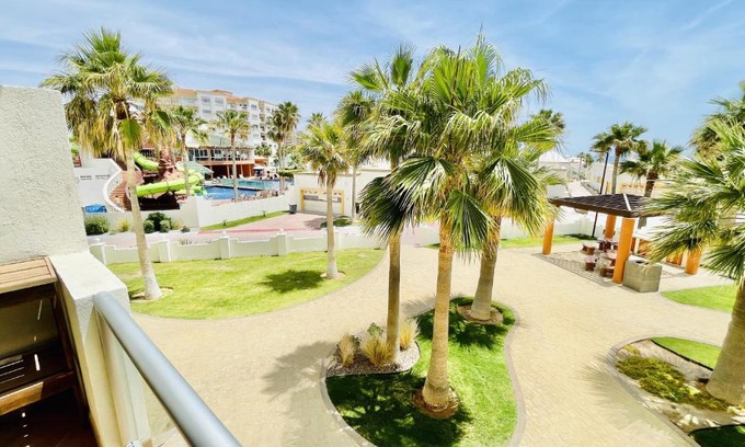 Centro Apartment | Seaside 1 Bedroom Condo with Pool at Las Palmas Resort