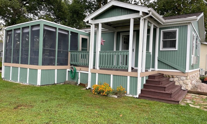 Brimfield House | Idyllic Lake Cottage with Boat Dock and Fire Pit Retreat