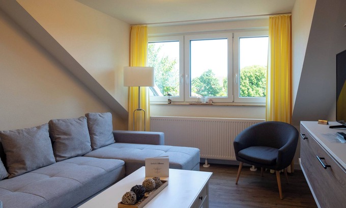 Spiekeroog Apartment | Elegant 3-Room Apartment with Oceanfront View in City Center