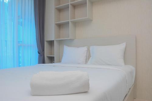 Kayu Putih Apartment | Relax in the Tifolia Apartment with Pool & Child-Friendly Perks