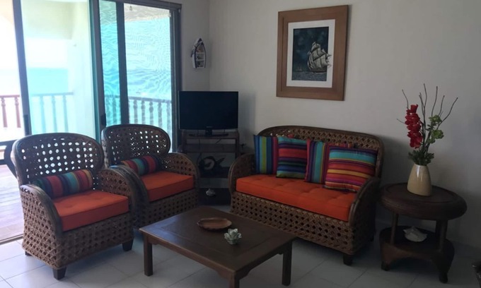 Chicxulub Puerto Apartment | Serene Apartment with Pool Overlooking Chixculub Sea