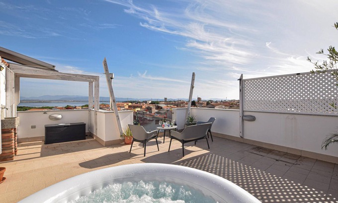 Sant'Antioco Apartment | Experience Breathtaking Ocean Views from a Rooftop Terrace