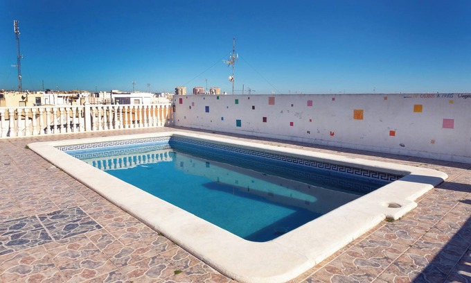Torrevieja Apartment | Inviting Beachfront Apartment with Pool and A/C Amenities