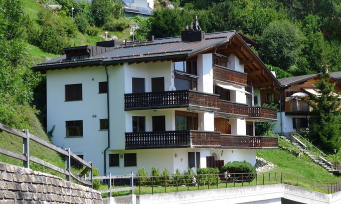 Laax Apartment | Scenic Apartment for 3 with Balcony & Lake View Amenities