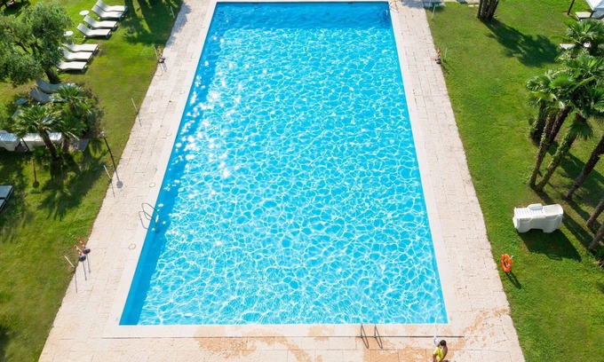 Riva del Garda Apartment | Inviting Apartment for 5 with Pool, Balcony & WIFI Access