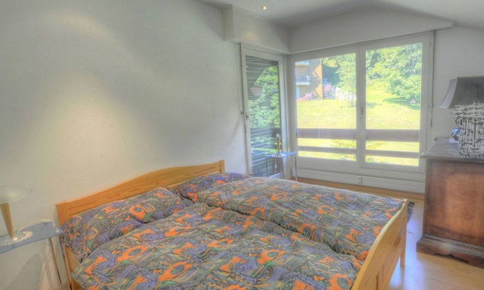 Ayent Apartment | Spacious Apartment for 8 with Hot Tub and Balcony Access
