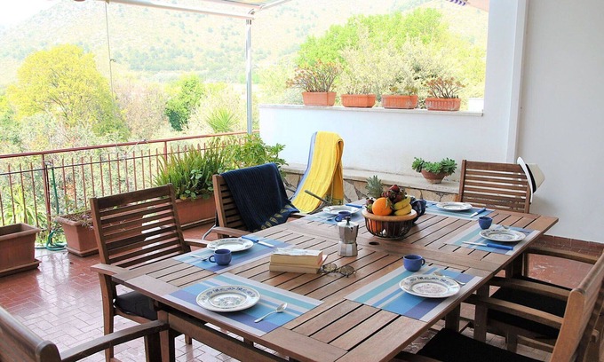 Sperlonga Apartment | Cozy Apartment for 7 with Ocean View and Pet-Friendly Perks
