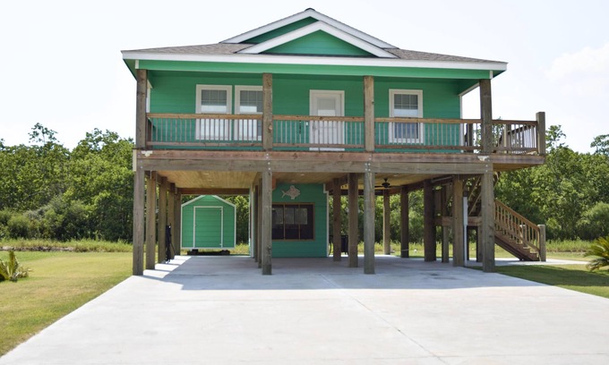 Hackberry House | Top-Rated Canalfront Retreat in Hackberry Near Beaches