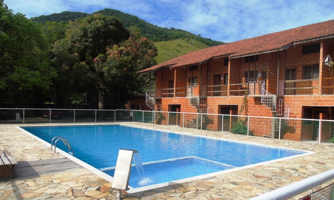Maranduba Apartment | Cozy Chalet in Gated Community with Pool & Family-Friendly Perks
