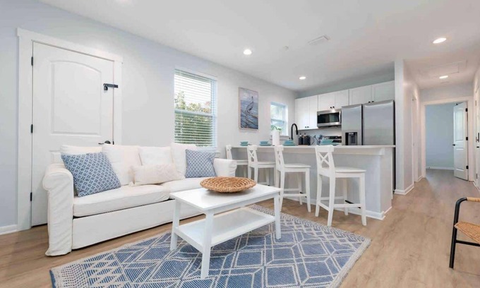 Neptune Beach Apartment | Discover Summer by the Sea: Pet-Friendly Family Retreat
