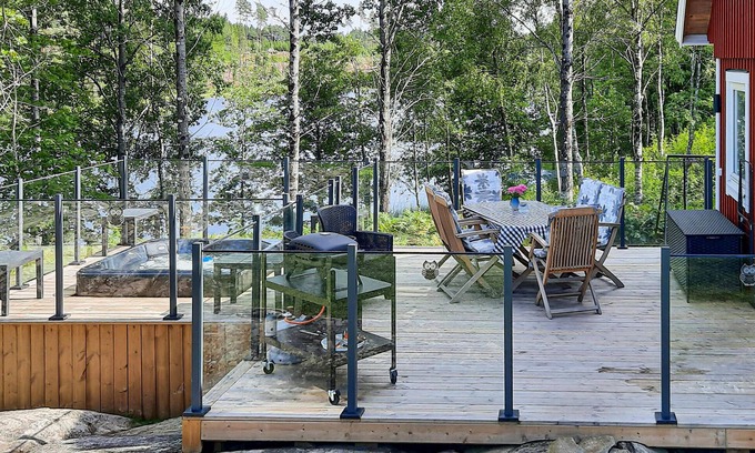 Alvsered House | Charming Cottage with Terrace and Scenic Lake Views