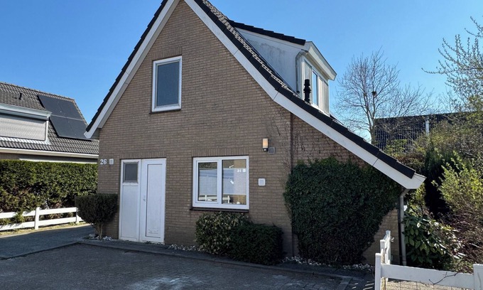 Ouddorp House | Delightful Deltageul26: Beachside Retreat with Spa & Views