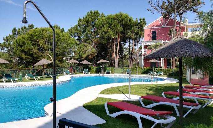 Islantilla Apartment | Charming Duplex with Pool, 5 Minutes to the Beach