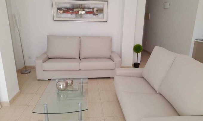 Cala Mandia Apartment | Cozy Duplex Steps from Cala Anguila Beaches with Ocean View