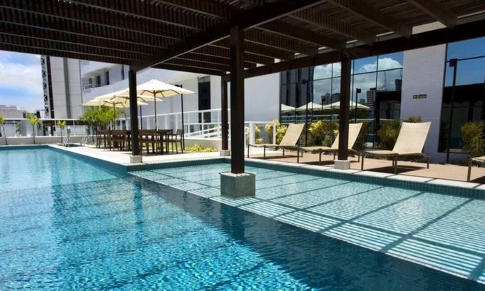 Caminho das Arvores Apartment | Cozy Flat Steps from Shopping Salvador with Pool Access