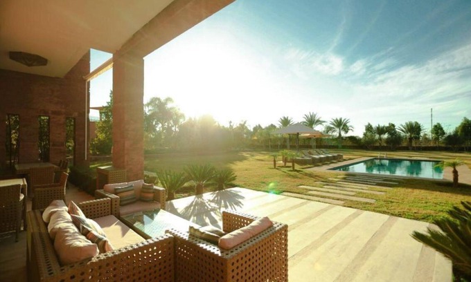 Palmeraie Villa | Elegant Villa Retreat with Heated Pool & Pet-Friendly Perks