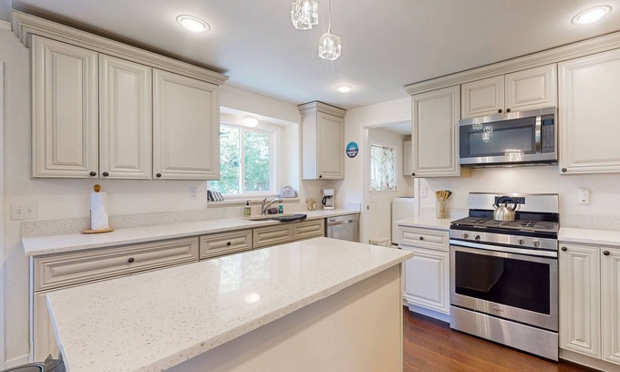 Bainbridge Island House | Inviting Farmhouse-Chic Retreat with Ocean View & Chef's Kitchen