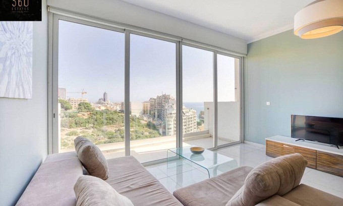Il-Balluta Apartment | Inviting Hill Apartment with Balcony and Ocean Views