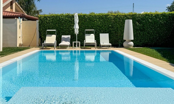 Modica House | Elegant Villa with Pool and Daylit Interiors for Your Escape