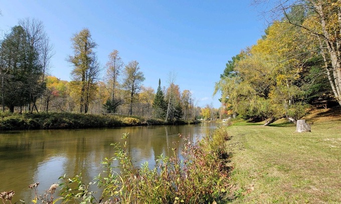Skidway Lake House | Idyllic Retreat on Rifle River: Kayaking and Wildlife Awaits