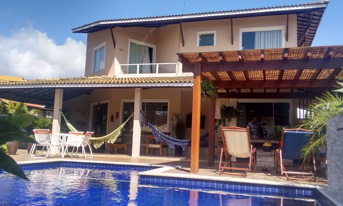 Canto do Mar House | Family-Friendly Oasis with Pool and Ocean View at Cond Paradise