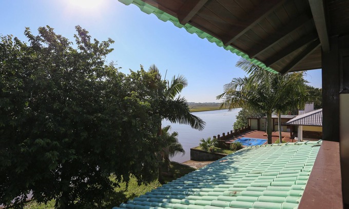 Torres House | Scenic Retreat by Mampituba River - Perfect for Families