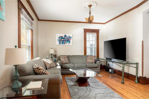 Traverse City House | Charming Home with AC, Fire Pit & Walkable Location